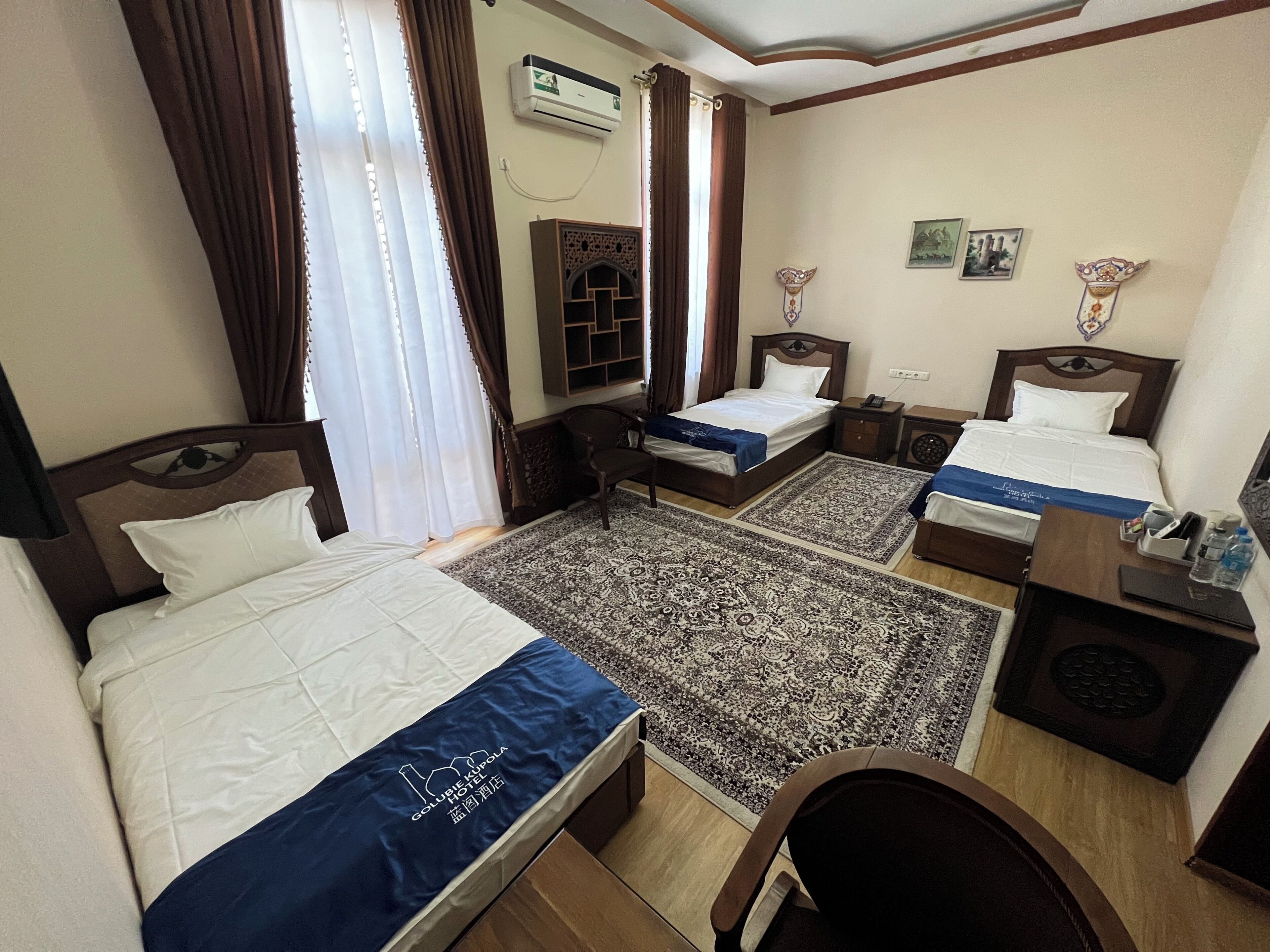 Quarto triplo clássico, vista para a cidade