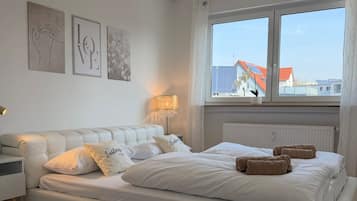 2 chambres, fer et planche à repasser, Wi-Fi, draps fournis