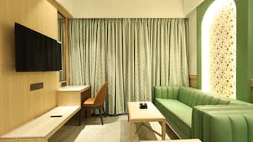 Suite Signature, vue ville | Coin séjour