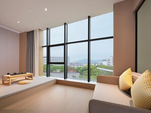 Deluxe Room, 1 King Bed with Sofa bed | Living area