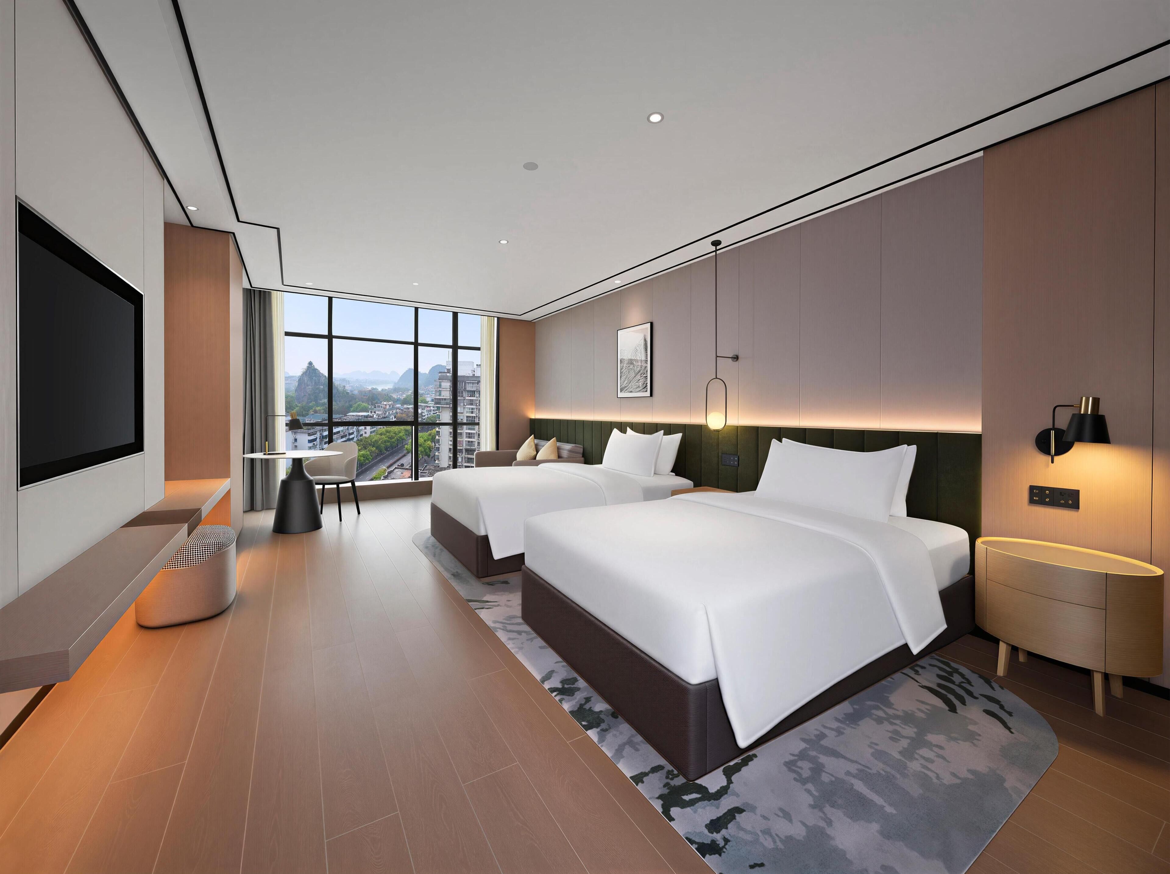 Habitación Deluxe, varias camas | Wifi gratis 