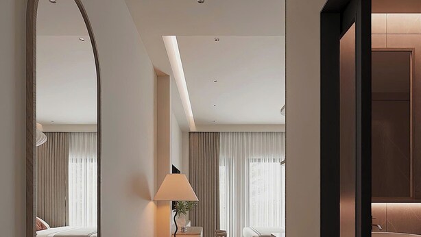 A modern hotel room with a large mirror, a bench, a desk, and a sofa. - Co Giang Premier Residence (Ho Chi Minh City)