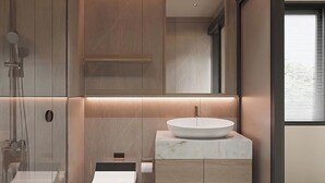 A modern bathroom with a glass-enclosed shower, a standalone toilet, and a vanity with a large mirror. - Co Giang Premier Residence (Ho Chi Minh City)