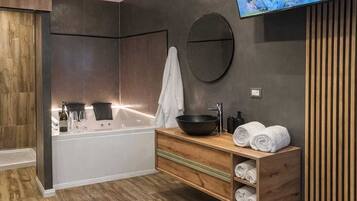 Jetted bath, hair dryer, bidet, towels