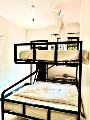 Pillowtop beds, minibar, in-room safe, individually decorated - Paki Hotels&apartment (Moshi)