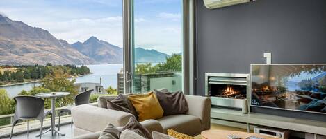 TV, fireplace, books, offices