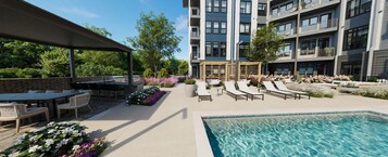 Apartamento (2 Bedrooms) | Piscina | Una piscina al aire libre de temporada