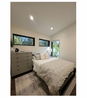 2 dormitorios, tabla de planchar con plancha, wifi gratis y ropa de cama
