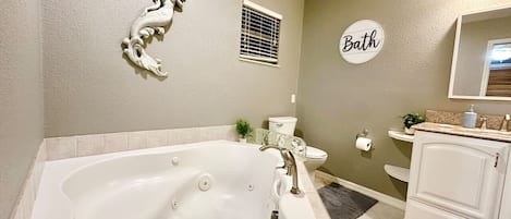 Jetted bath, hair dryer, towels, soap