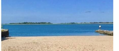 On the beach, sun loungers, beach towels
