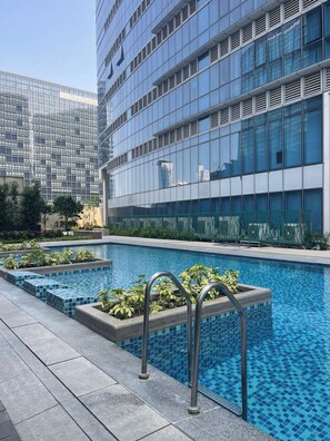 Outdoor pool - Spacious Living at Uptown Parksuites (Taguig)