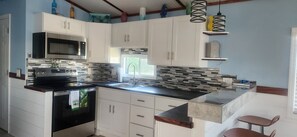 Private kitchen - Escape to 3 Palms, your relaxing retreat in Fort Myers Beach! (Fort Myers Beach)