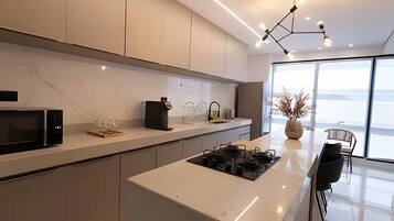 Fridge, microwave, cookware/dishes/utensils