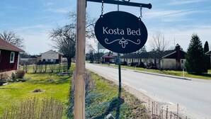 A sign for 'Kosta Bed' with a simple, elegant design. - 6 Person Holiday Home in Kosta (Kosta)