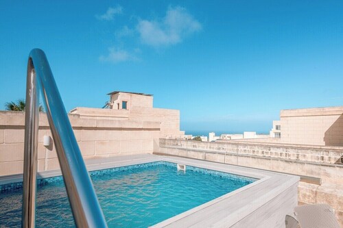Stunning 350-year-old home with roof splash pool