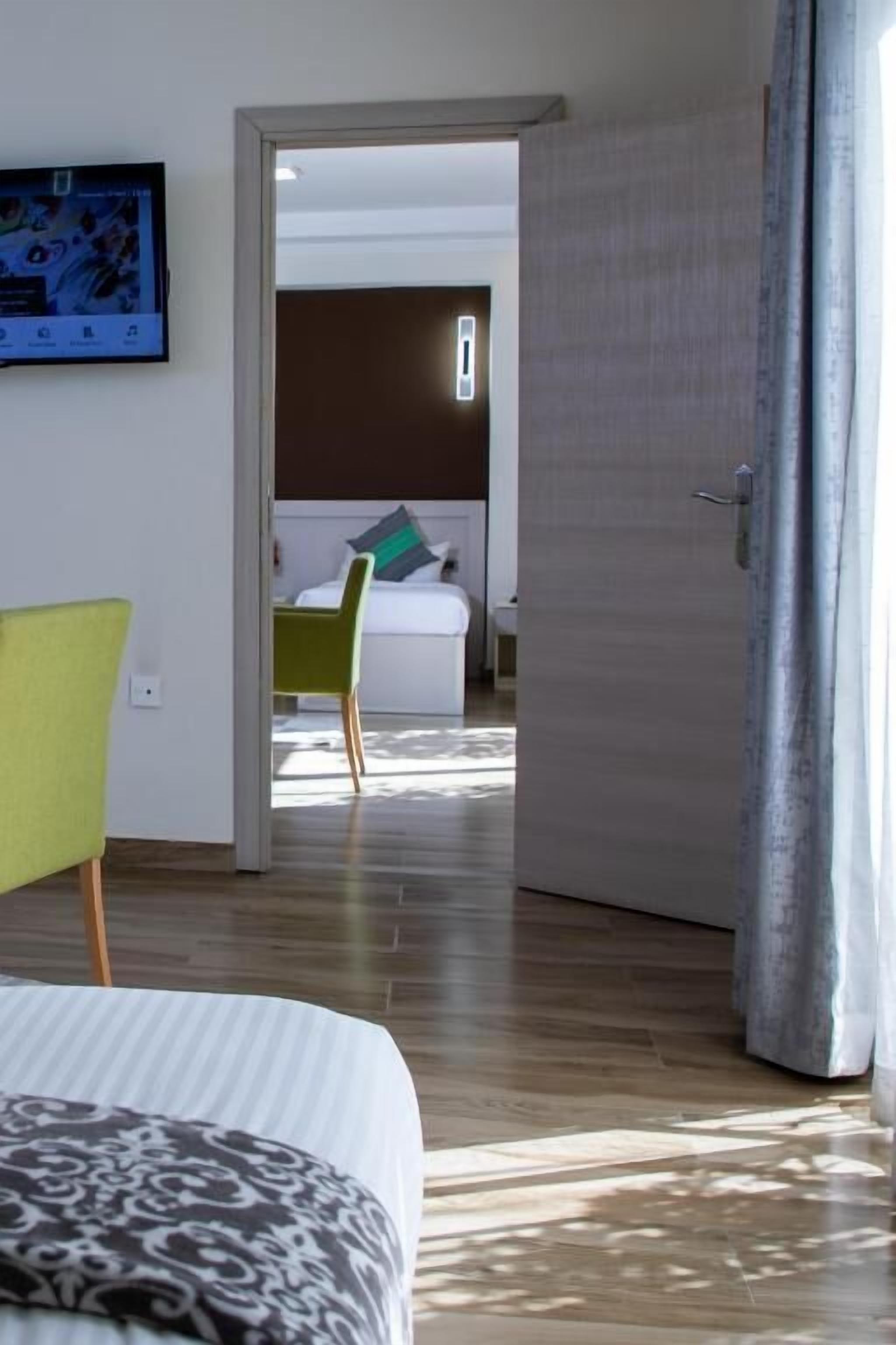Family Twin Room, Balcony | Blackout curtains, soundproofing, iron/ironing board, free WiFi