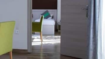 Family Twin Room, Balcony | Blackout curtains, soundproofing, iron/ironing board, free WiFi