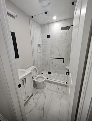 Hair dryer, towels, soap, toilet paper