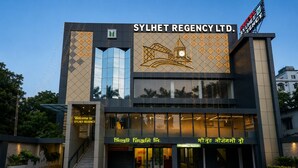 A modern hotel with a prominent sign reading 'SYLHET REGENCY LTD.' and a large glass facade. - Sylhet Regency Ltd. (Sylhet)