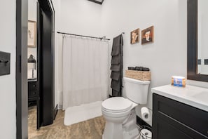 Hair dryer, towels, soap, toilet paper