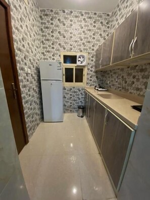 Suite, 2 Bedrooms | Private kitchen - The view serviced apartments (Khamis Mushait)