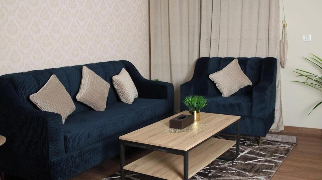 Suite, 2 Bedrooms | Living area | TV