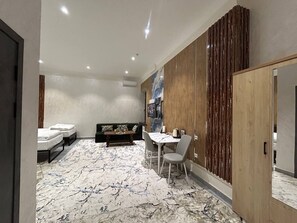 Deluxe driepersoonskamer, veranda | Interieur