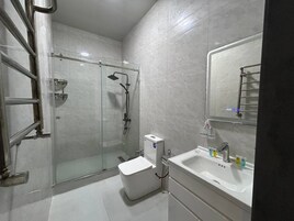 Hair dryer, slippers, towels