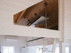 A room with a sloped ceiling, white walls, and a visible ductwork system. - 4 Star Holiday Home in Korsor (Korsor)