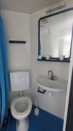 Shower, hair dryer, towels, soap. Quadruple hotel room