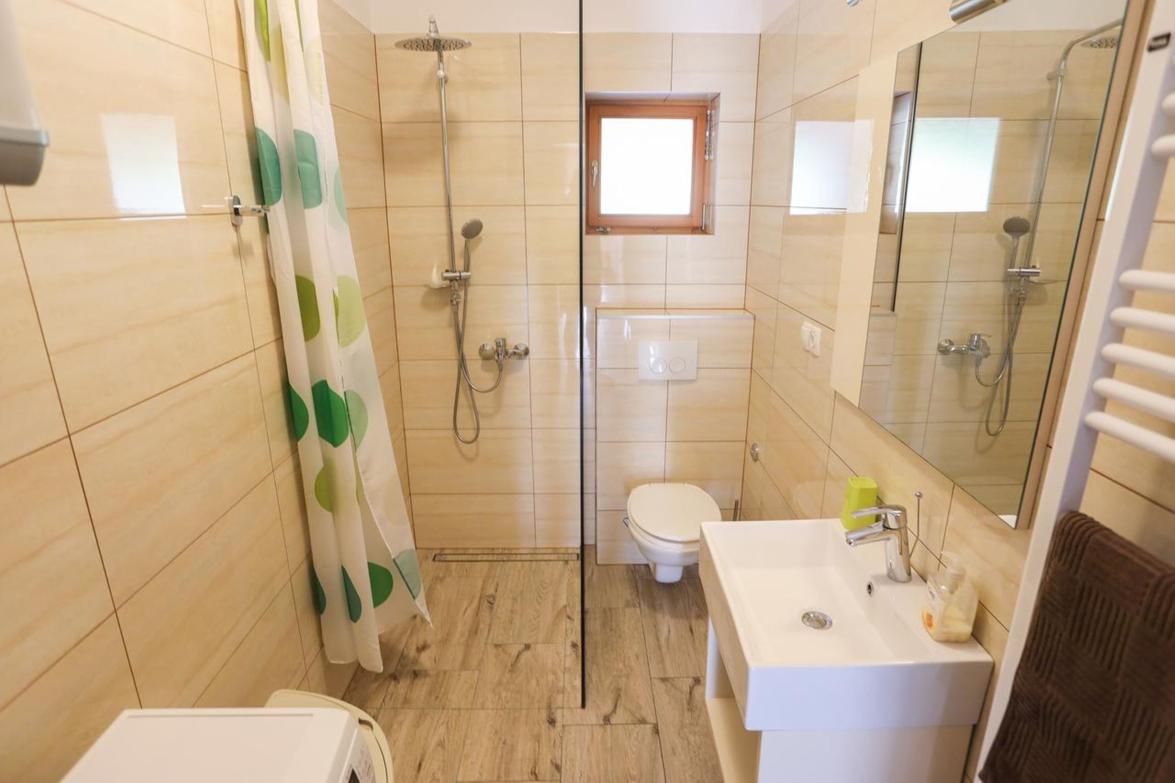 Shower, hair dryer, towels, toilet paper