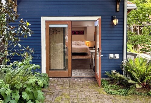 Secret garden cottage studio retreat in Seattle's beachside neighborhood.