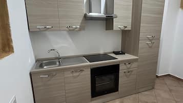 Casa, 1 quarto, vista para o pátio | Cozinha privada