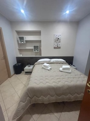 Comfort Quadruple Room, Balcony, Courtyard View