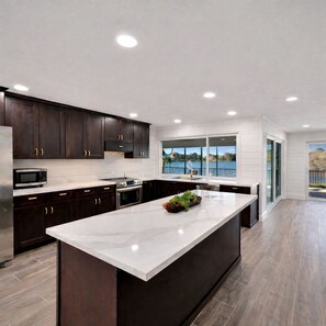 Fridge, microwave, oven, stovetop - West Gulf Sanibel • Stunning Lakefront Views • Heated Pool • Short Walk to Beach (Sanibel)