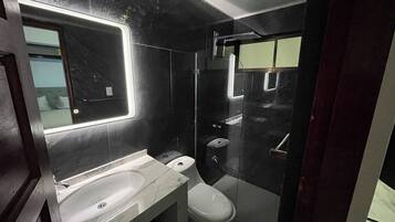 Shower, towels, soap, shampoo