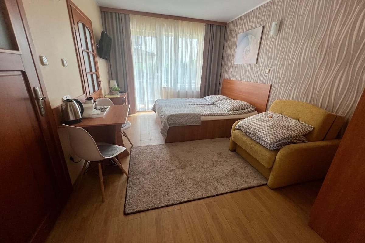 Blackout curtains, soundproofing, iron/ironing board (on request)