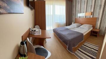 Blackout drapes, soundproofing, iron/ironing board, free WiFi