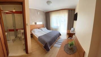 Blackout drapes, soundproofing, iron/ironing board, free WiFi