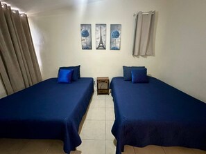 2 habitaciones, tabla de planchar con plancha, wifi y ropa de cama 
