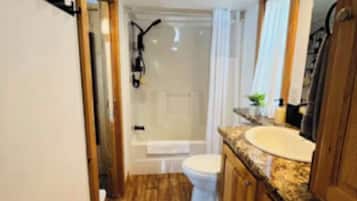 Hair dryer, towels, soap, shampoo