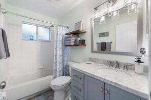 Shower, hair dryer, towels