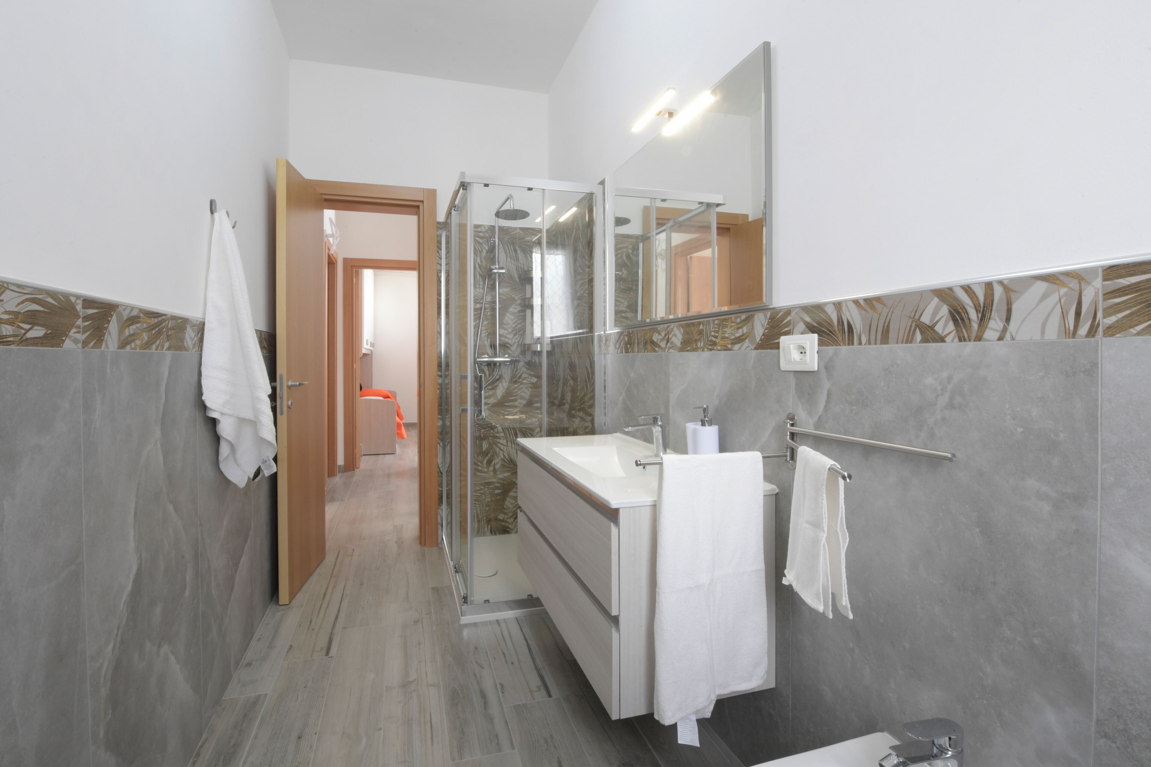 Hair dryer, bidet, towels, soap