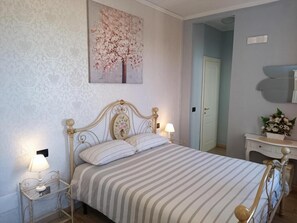 Superior Double Room, Garden View | In-room safe, desk, soundproofing, iron/ironing board