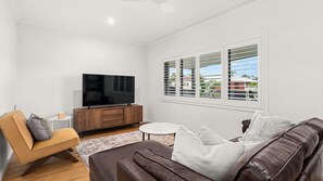 TV, books - Coastal Family Escape, Pool, Yard & 150m to Warilla Beach (Warilla)