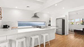 Fridge, microwave, oven, stovetop - Coastal Family Escape, Pool, Yard & 150m to Warilla Beach (Warilla)