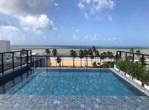 Comfort Studio, Partial Sea View | Pool | Outdoor pool, sun loungers - 509 Studio em Cabo Branco (João Pessoa)