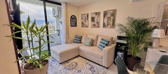 Apartment with views, balcony, gym, and parking.