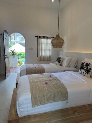 Deluxe Twin Room, Balcony, Pool View | In-room safe, blackout drapes, soundproofing, free WiFi
