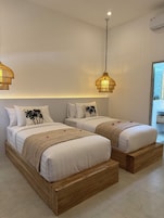 Deluxe Twin Room, Balcony, Pool View | In-room safe, blackout curtains, soundproofing, free WiFi